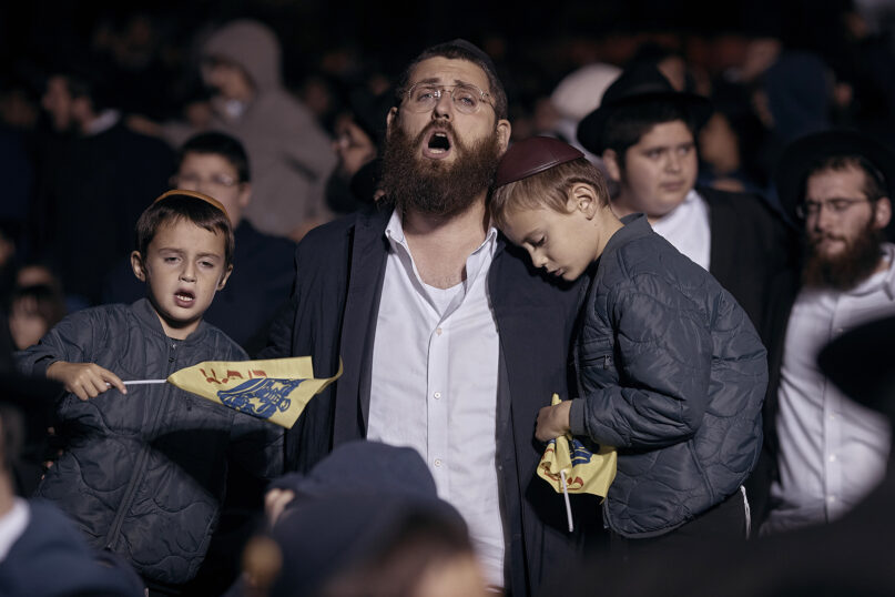 Chabad-Lubavitch Orthodox Jews sing during a vigil held in solidarity and prayer for Israel on Oct. 9, 2023, in New York. (AP Photo/Andres Kudacki)