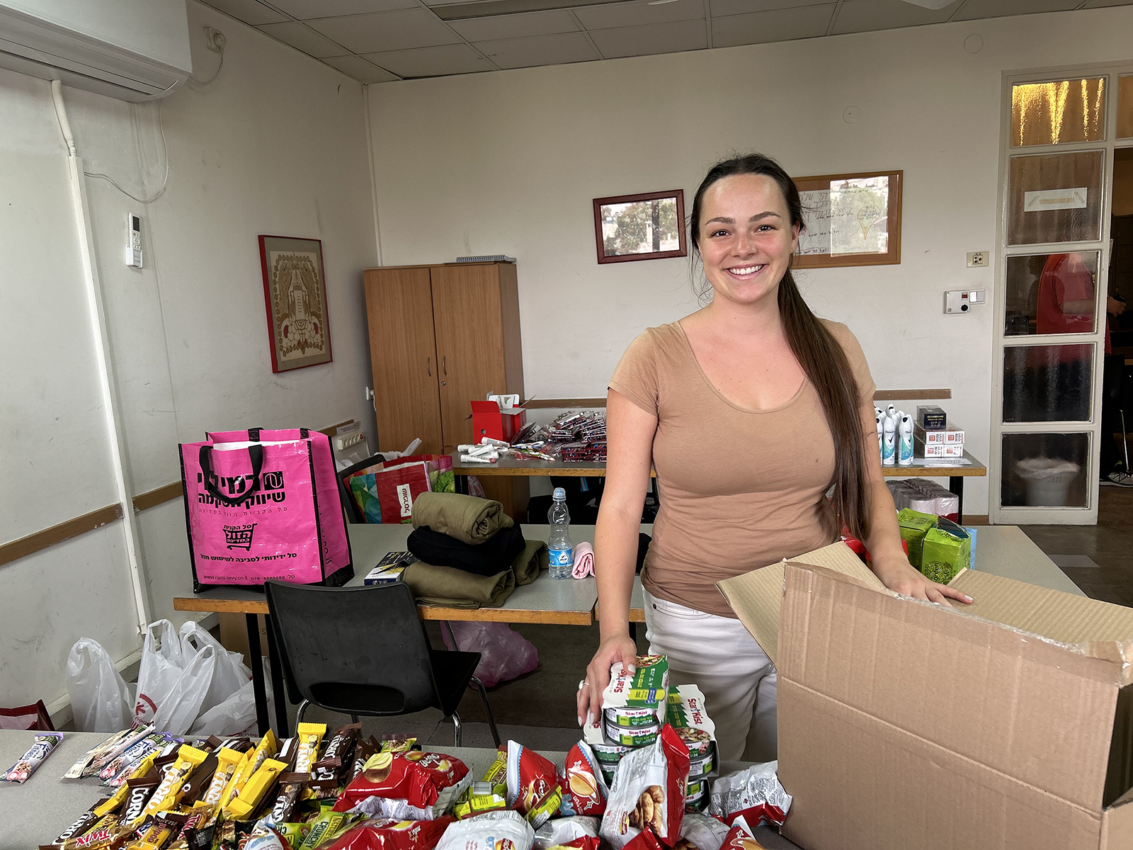 Samantha Cooper, a student at the Pardes Institute of Jewish Studies in Jerusalem, launched a student-run project to provide Israeli soldiers and Bedouin families in southern Israel with food and other essentials during wartime. Photo by Michele Chabin