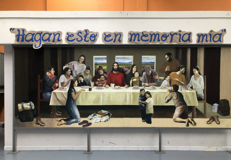 A migrant respite center in Nogales, Mexico, houses this mural, “Do this in Memory of Me,” in its dining hall. The artist is a migrant. Photo by Jennifer Butler