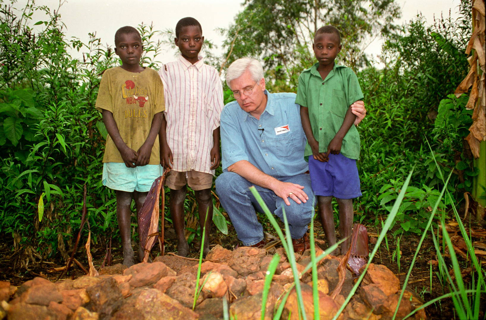 Rich Stearns visited Uganda in August 1998 to meet his sponsored child Richard Sseremba and his two brothers, orphans who lost their parents to AIDS. (© 1998 World Vision/photo by Jon Warren)