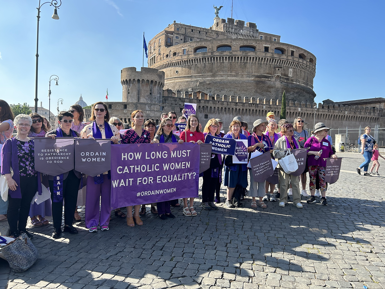 Dozens of women march to the Vatican, Friday, Oct. 6, 2023, calling for female ordination. RNS photo by Tom Reese