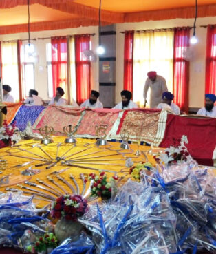 Mounds of toy airplanes pile up on tables inside Talhan Gurdwara. Photo courtesy Talhan Sahib Instagram