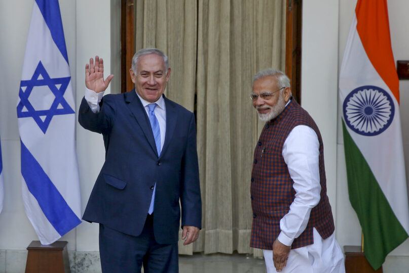 FILE- India's Prime Minister Narendra Modi, right gestures and Israeli Prime Minister Benjamin Netanyahu waves to the media as they arrive for a meeting in New Delhi, India, Jan.15, 2018. Modi, a staunch Hindu nationalist, was one of the first global leaders to swiftly express solidarity with Israel and call the Hamas attack “terrorism.” Modi became the first Indian prime minister to visit Israel in 2017. Netanyahu, travelled to New Delhi the following year and called the relationship between New Delhi and Tel Aviv a “marriage made in heaven.” (AP Photo, File)