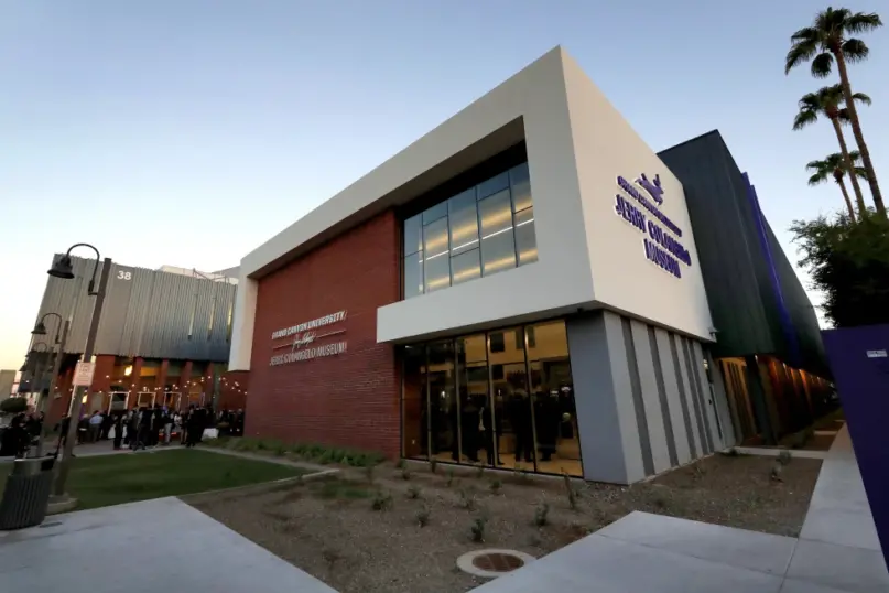 The Jerry Colangelo Museum at Grand Canyon University is seen at at dusk in Phoenix, on Sept. 20, 2017. Grand Canyon University, the country’s largest Christian university, is being fined $37.7 million by the federal government amid accusations that it misled students about the cost of its graduate programs. (AP Photo/Matt York, File)