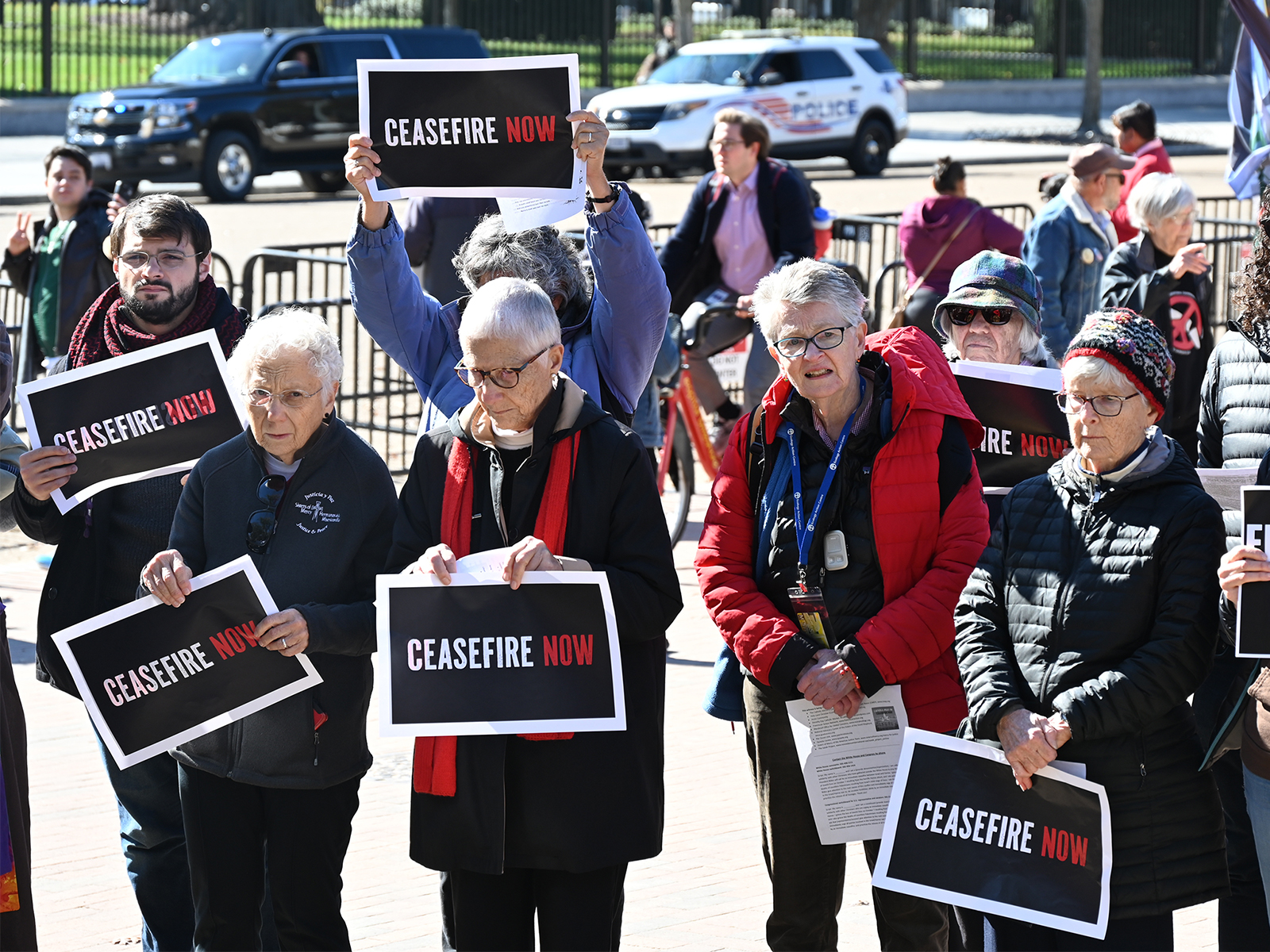Catholic activists demonstrate outside the White House, Thursday, Nov. 2, 2023, in Washington. (RNS photo/Jack Jenkins)