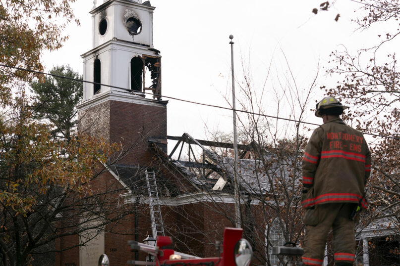 Firefighters respond after a fire broke out at The Church of Jesus Christ of Latter-day Saints in Chevy Chase, Md., Nov. 20, 2023. (AP Photo/Jose Luis Magana)