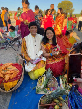 Sunil and Shalini Singh during a Chhath Puja celebration. (Photo courtesy Sunil and Shalini Singh)