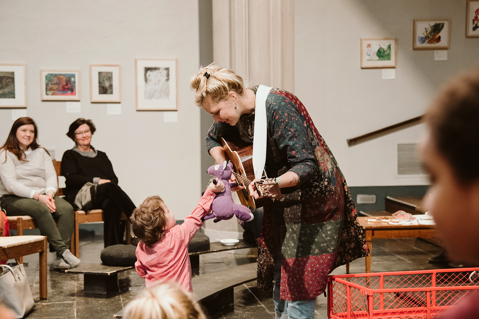 Musician and pastor Rebecca Stevens-Walter interacts with a child during an intergenerational worship service in 2018. (Photo by Ashley Busone Rodriguez)