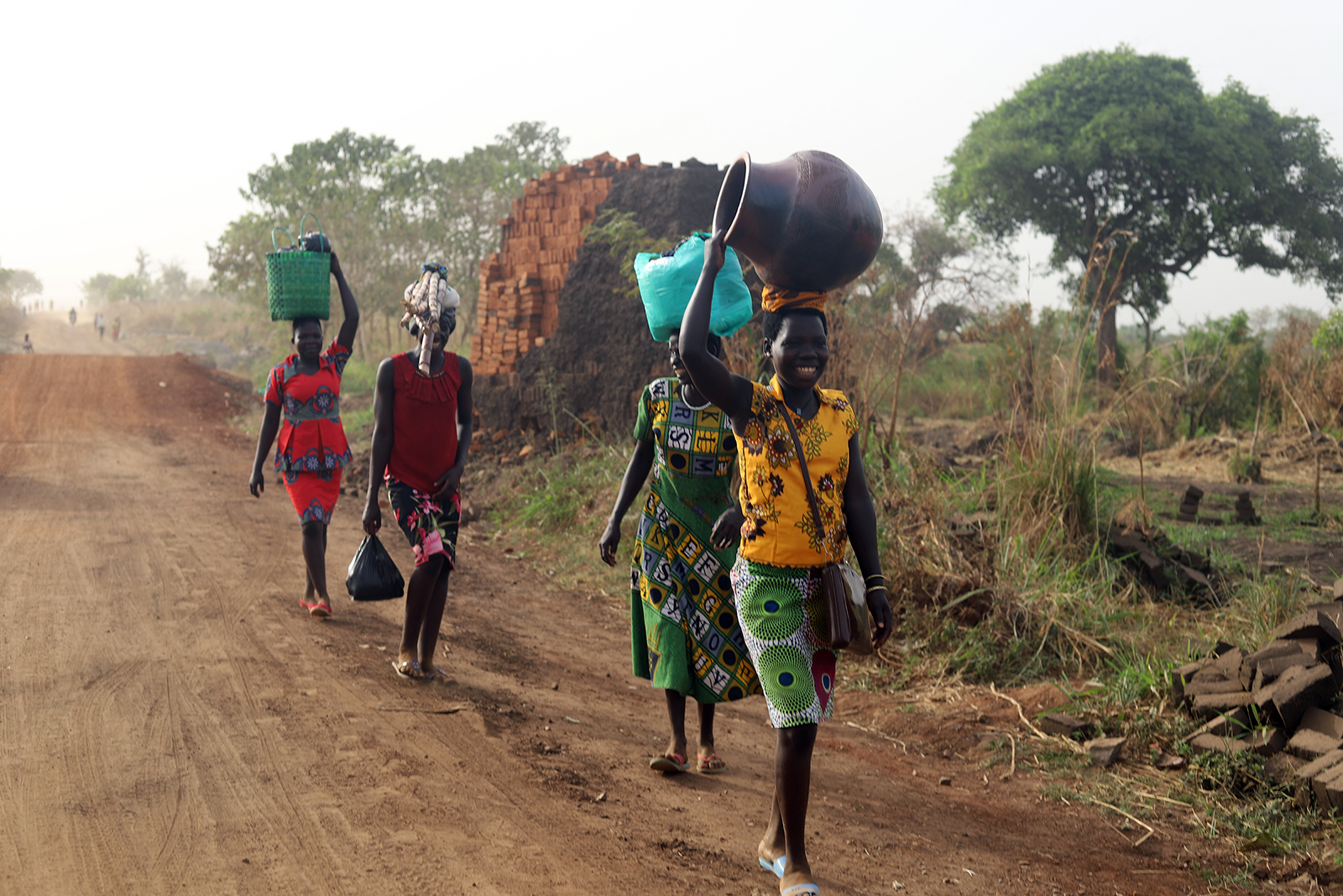 People walk along a road in eastern Congo. (RNS photo/Tonny Onyulo)