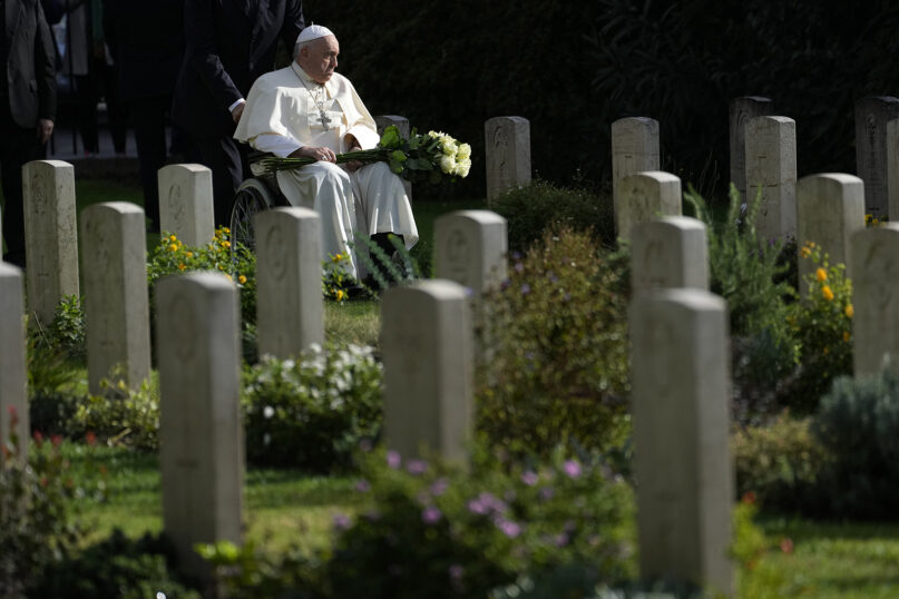 Pope Francis arrives to hold a Mass for the dead at Rome’s Commonwealth cemetery with the graves of 426 war dead from World War II, Nov. 2, 2023. The Mass comes on Italy’s Nov. 2 holiday to honor the dead. (AP Photo/Andrew Medichini)