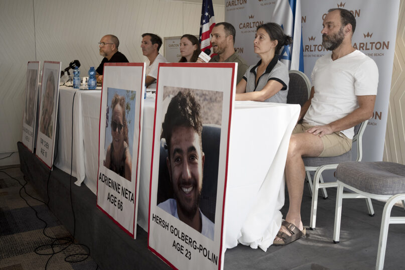Relatives of U.S. citizens that are missing since the Hamas attack attend a news conference in Tel Aviv, Israel, on Tuesday, Oct. 10, 2023. Seated from left: Jonathan Dekel-Chen, father of Sagui Dekel-Chen (35) from Nahal Oz; Ruby Chen, father of Itay Chen, 19, a soldier in the armored corps; Ayala Neta, daughter, and Nahal Neta, son of Adrienne Neta, 66, a nurse living in Kibbitz Be'eri; Rachel Goldberg, mother of Hersh Goldberg-Polin, 23, who was attending the music festival, and Jonathan Polin, Hersh's father.  (AP Photo/Maya Alleruzzo)