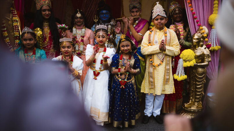 Costumed youth pose together during the annual Diwali Motorcade celebrations in the Little Guyana neighborhood of Queens, New York, Saturday, Nov. 4, 2023. (Photo © Mat McDermott)
