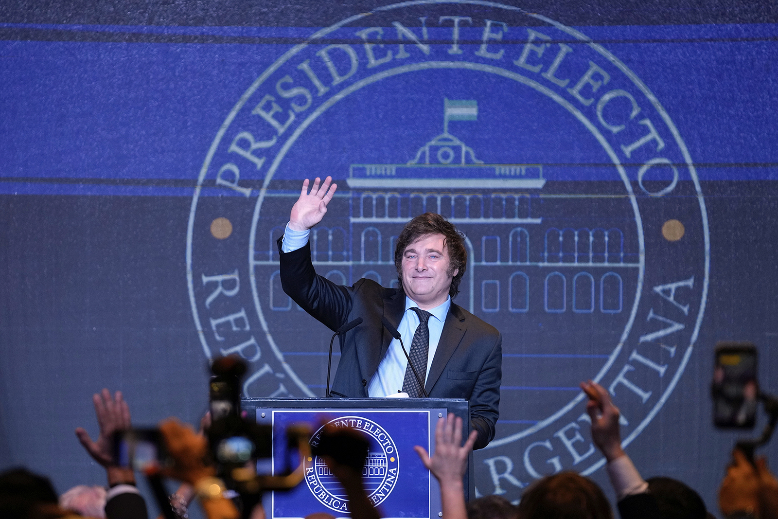Presidential candidate of the Liberty Advances coalition Javier Milei waves during his victory speech after winning the presidential runoff election in Buenos Aires, Argentina, Sunday, Nov. 19, 2023. (AP Photo/Natacha Pisarenko)