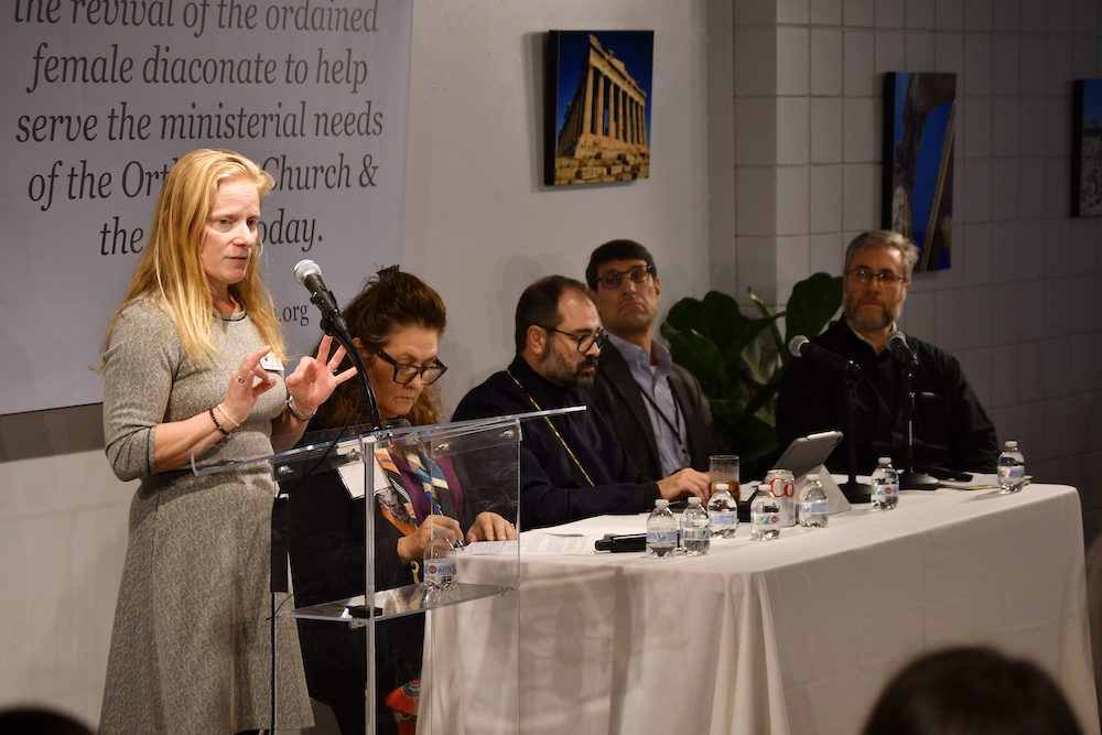 Carrie Frederick Frost, left, addresses a symposium on women deacons held Nov. 10-12, 2023, at Hellenic College Holy Cross Greek Orthodox School of Theology and St. Mary Orthodox Church in Brookline, Mass. (Photo by Sarah Riccardi-Swartz and JD Swartz/St. Phoebe Center)