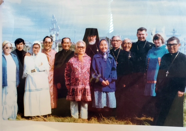 Olga Michael, center right, with husband Nicolai, to her right, with elders in an undated photo. (Photo courtesy Orthodox Church in America)