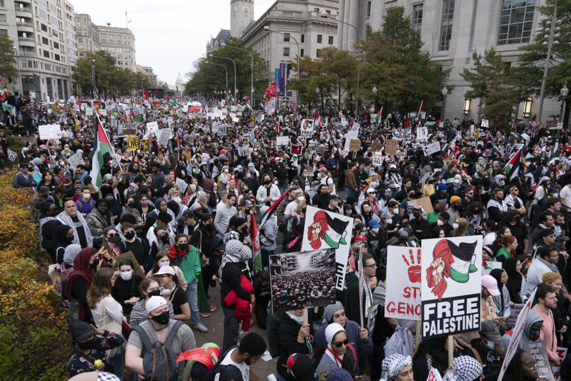 With the U.S. Capitol in the background, tens of thousands of anti-war activists rally during a pro-Palestinian demonstration asking for a cease-fire in Gaza, at the Freedom Plaza in Washington, Saturday, Nov. 4, 2023. (AP Photo/Jose Luis Magana)