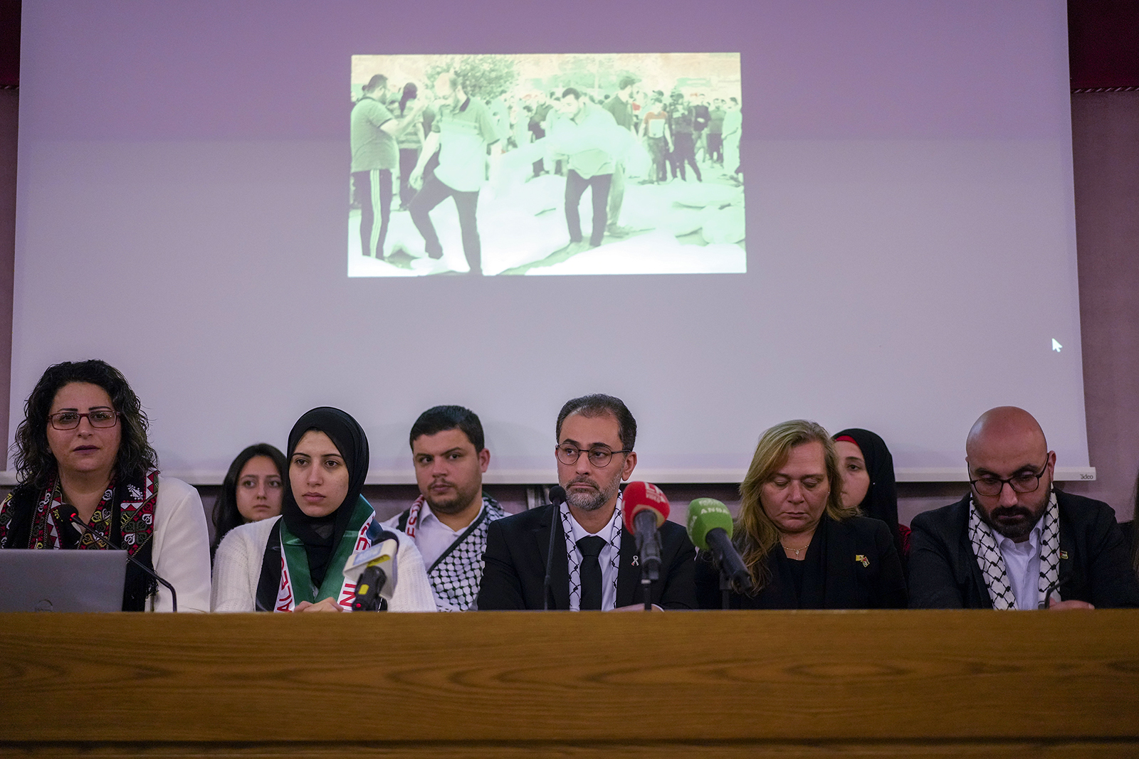 Family members of Palestinians living in Gaza attend a press conference at the Vatican after meeting with Pope Francis, Wednesday, Nov. 22, 2023. Pope Francis, before his Wednesday's general audience, met with family members of Palestinians living in Gaza and of the over 220 Israeli abducted by Hamas militants on Oct. 7 and believed to be held hostages in Gaza. (AP Photo/Andrew Medichini)