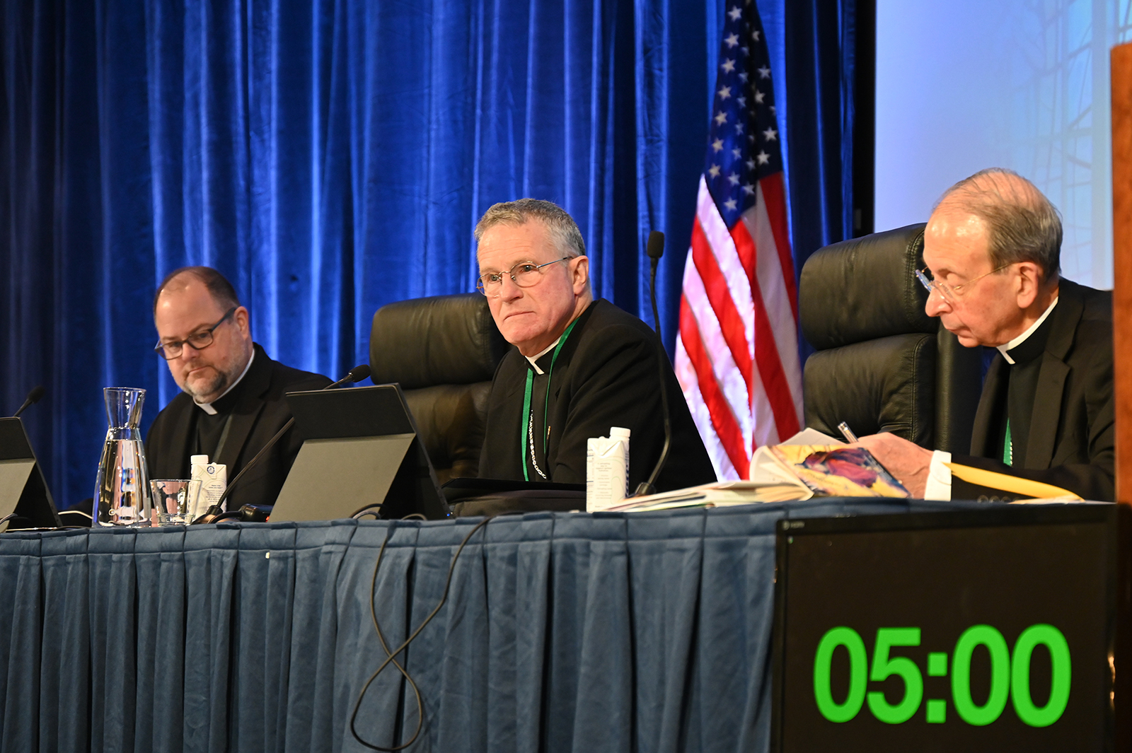 USCCB President Archbishop Timothy P. Broglio, center, presides over the annual fall gathering of the U.S. Conference of Catholic Bishops, Wednesday, Nov. 15, 2023, in Baltimore. (RNS photo/Jack Jenkins)