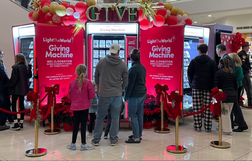 Shoppers surround the Giving Machines at Kenwood Mall in Cincinnati on Dec. 20, 2023. (Photo by Jana Riess)
