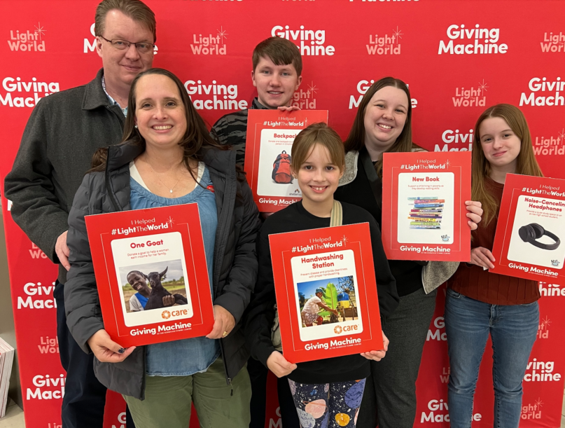 This family came to the mall as part of their ward's activity night to donate through the Giving Machines. Eric and Melissa Hansen, Kora and Danny Tolman, and Kallen and Kensington Hansen.
