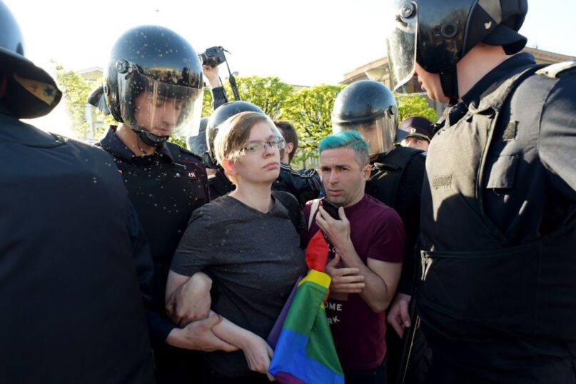 Russian riot police detain gay rights activists during World Day Against Homophobia and Transphobia in St. Petersburg in 2019. (Olga Maltseva/AFP via Getty Images)