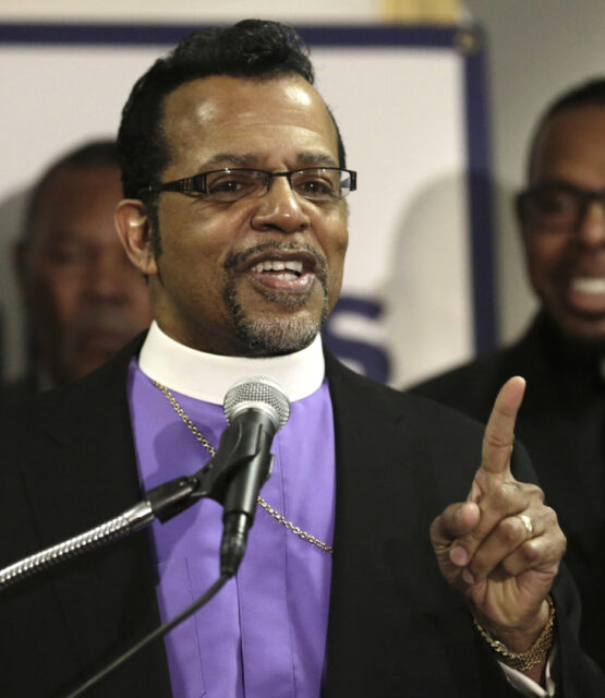 FILE - Bishop Carlton Pearson speaks at a news conference accompanied by several other clergy members, April 4, 2013, in Chicago. Before his peers would label him a heretic, the late Bishop Carlton D. Pearson was once one of the best known preachers in the nation. In the 2000s. Pearson underwent a cataclysmic theological shift that altered the course of his life – and his legacy among the canon of American Christian leaders. (AP Photo/M. Spencer Green, file)