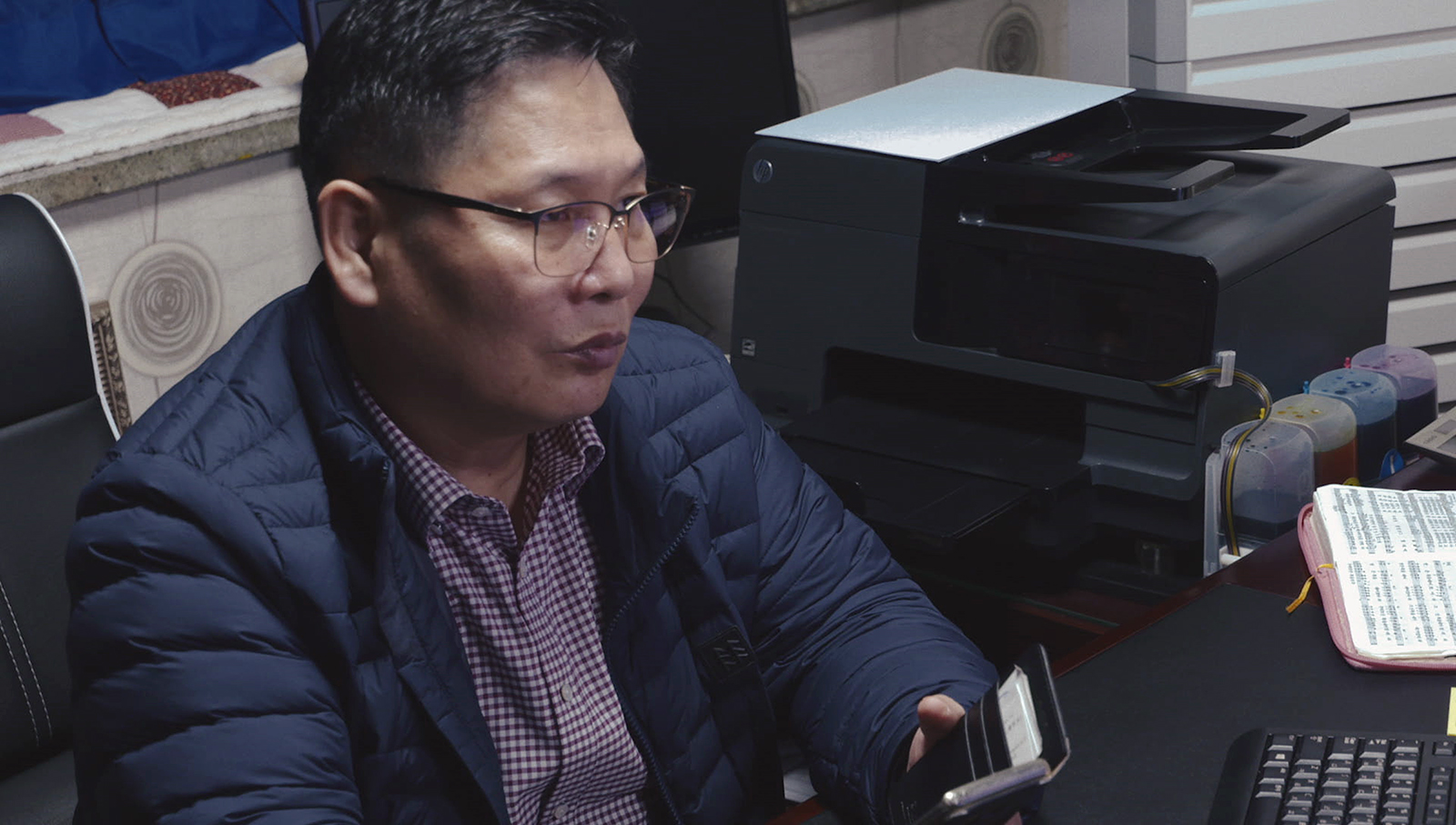 Pastor Seungeun Kim in a scene from the documentary “Beyond Utopia." (Photo courtesy Beyond Utopia)