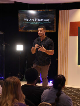Danny Prada shares a message during a service at Heartway spiritual community in the Miami area. (Photo courtesy of Heartway)
