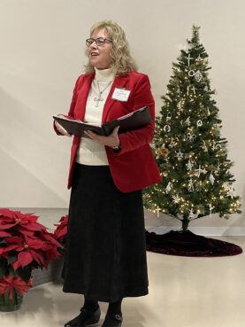 The Rev. Suzanne Michael leads a group of remnant United Methodists in their first Advent service on Dec. 3, 2023, in Advance, North Carolina. (RNS photo/Yonat Shimron)