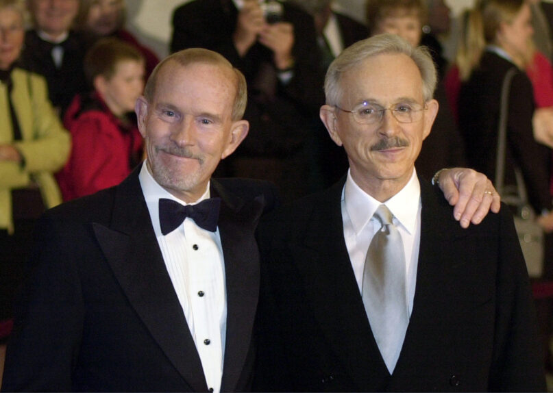 This Oct. 29, 2002, file photo shows the Smothers Brothers, Tom Smothers, left, and Dick Smothers, at the Kennedy Center in Washington for the Mark Twain Prize for Humor Award ceremony honoring Bob Newhart. Tom Smothers, half of the Smother Brothers and the co-host of one of the most socially conscious and groundbreaking television shows in the history of the medium, has died, Dec. 26, 2023, at 86. (AP Photo/Lawrence Jackson, File)