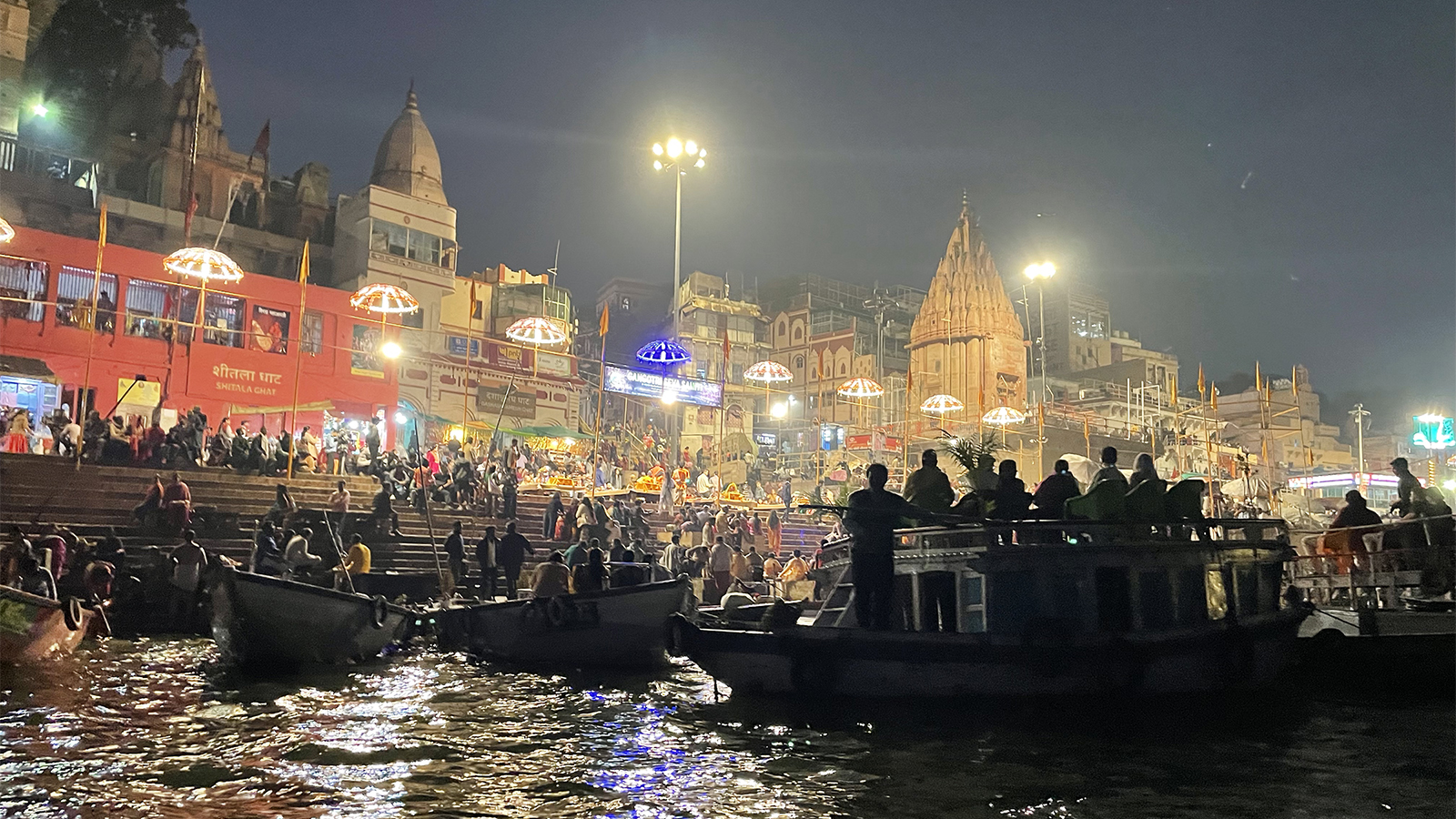 Boats fill the Ganges River at Assi Ghat in Varanasi, India, Dec. 11, 2023. (RNS photo/Richa Karmarkar)