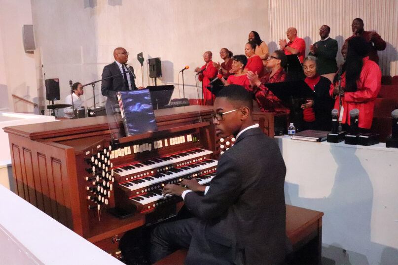 Storeé Denson accompanies the Nineteenth Street Baptist Church choir in Washington, D.C., Dec. 10, 2023. (RNS photo/Adelle M. Banks)