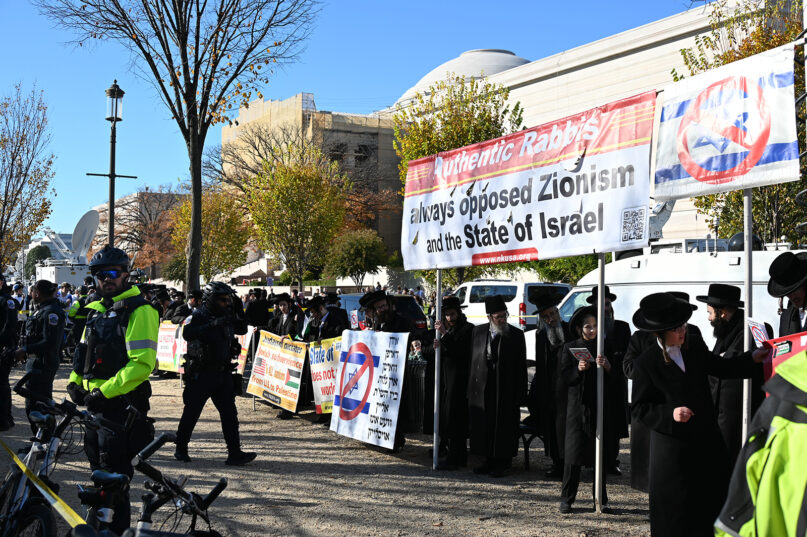 Members of the anti-Zionist subset of the U.S. ultra-Orthodox Jewish community counterprotest during the March for Israel on Nov. 14, 2023, in Washington. (RNS photo/Jack Jenkins)