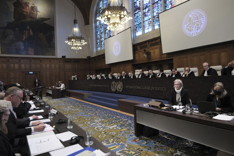 Judges and parties at the opening of the hearings at the International Court of Justice in The Hague, Netherlands, Thursday, Jan. 11, 2024. The United Nations' top court opens hearings Thursday into South Africa's allegation that Israel's war with Hamas amounts to genocide against Palestinians, a claim that Israel strongly denies. (AP Photo/Patrick Post)
