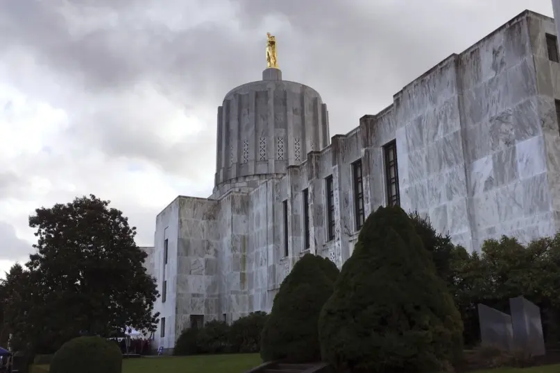 Clouds hover over the Oregon Capitol, Jan. 11, 2018, in Salem, Ore. Rep. E. Werner Reschke, a Republican Oregon lawmaker, has suggested that “you don’t want” Muslims, atheists and other non-Christians to serve in elected office. Reschke made the comments in a Jan. 17, 2024, appearance on “Save the Nation,” a talk show streamed on Facebook that is affiliated with the National Association of Christian Lawmakers, Oregon Public Broadcasting reported Monday, Jan 29. (AP Photo/Andrew Selsky, File)