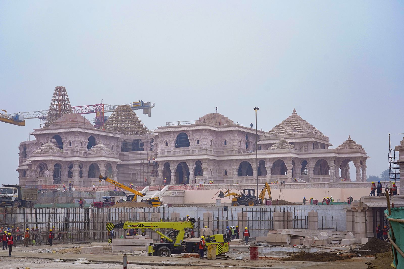 Construction crews works on Ram Mandir, a Hindu temple dedicated to Lord Ram in Ayodhya, India, Tuesday, Jan. 16, 2024. Frenzied preparations are underway in this northern city to mark the opening of the grand temple for Lord Ram, one of Hinduism's most revered deities, culminating a decades-long Hindu nationalist pledge. (AP Photo/Deepak Sharma)