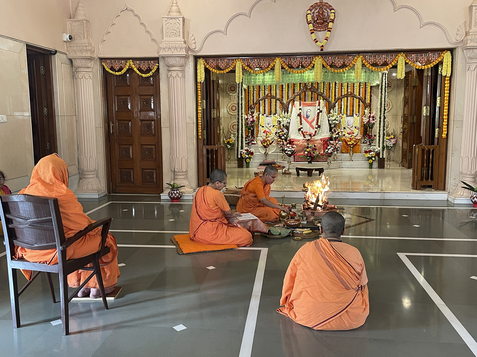 Female Hindu monks celebrate Sarada Devi’s birth anniversary on Jan. 3, 2024, with a ceremonial fire at Sri Sarada Math in Pune, India. (RNS photo/Richa Karmarkar)