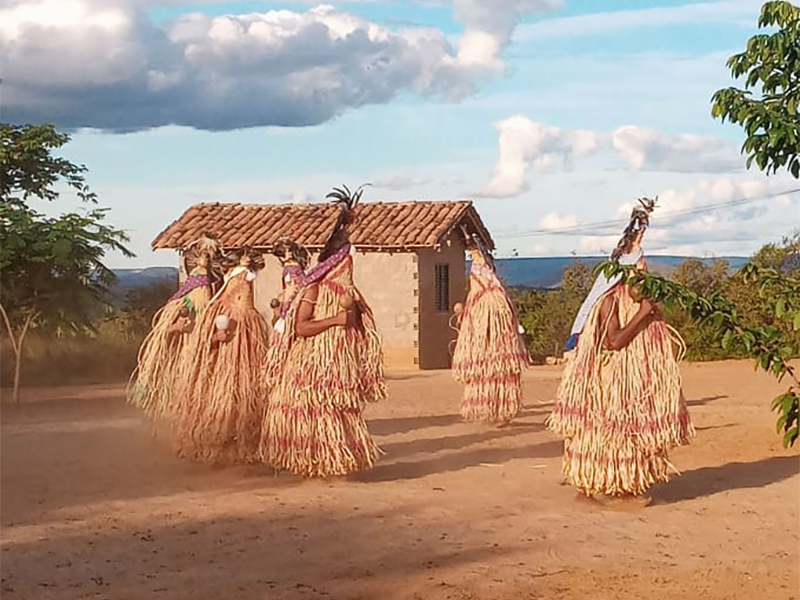 Members of the Pankararu indigenous people perform the toré ritual, with the "enchanted" wearing the croá-made praiás, or sacred garments, in state of Minas Gerais, Brazil. (Photo by Eduardo Campos Lima)
