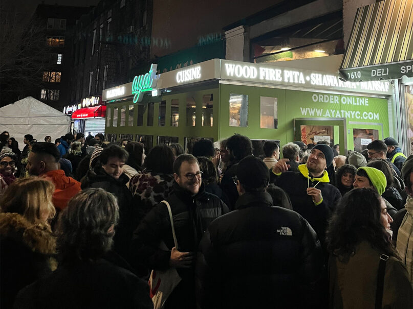 Customers line up outside Ayat, a Palestinian restaurant in Ditmas Park, Brooklyn, on Friday, Jan. 26, 2024. (RNS photo/Fiona André)