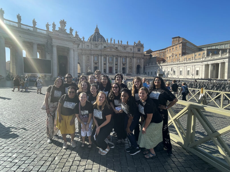 JoAnn Melina Lopez, farthest right, attends a pilgrimage of young adults in Rome to pray for the synod delegates and join in opening events in early October 2023. (Photo by Kascha Sanor)