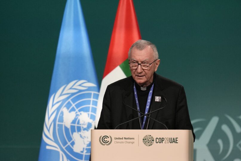 FILE - Vatican secretary of state, Cardinal Pietro Parolin, speaks during a plenary session at the COP28 U.N. Climate Summit, Saturday, Dec. 2, 2023, in Dubai, United Arab Emirates. Israel has formally complained after the Vatican No. 2 spoke of the “carnage” in Gaza and what he termed a disproportionate Israeli military operation following the Oct. 7 Hamas attacks. (AP Photo/Rafiq Maqbool, File)
