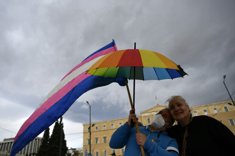 Supporters of same-sex marriage bill take part in a rally, at central Syntagma Square, in Athens, Greece, Thursday, Feb. 15, 2024. Greece's parliament is to vote Thursday to legalize same-sex civil marriage in a first for an Orthodox Christian country and despite opposition from the influential Greek Church. (AP Photo/Michael Varaklas)