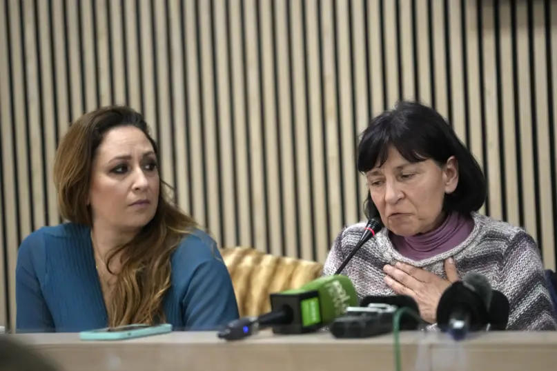 Lawyer Laura Sgro, left, listens to Gloria Branciani during a press conference in Rome, Wednesday, Feb. 21, 2024.