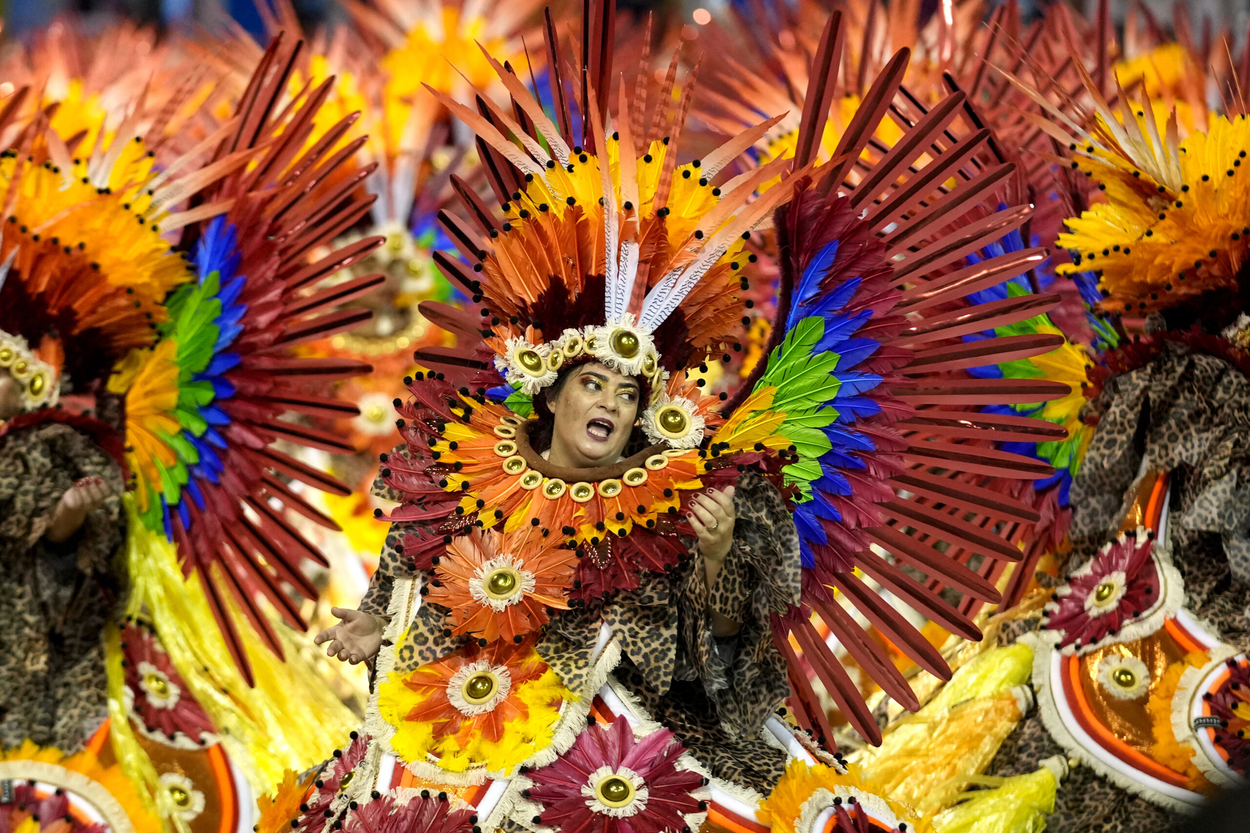 A dancer from the Tom Maior samba school performs during a Carnival parade in Sao Paulo, Brazil, early Sunday, Feb. 11, 2024. (AP Photo/Andre Penner)