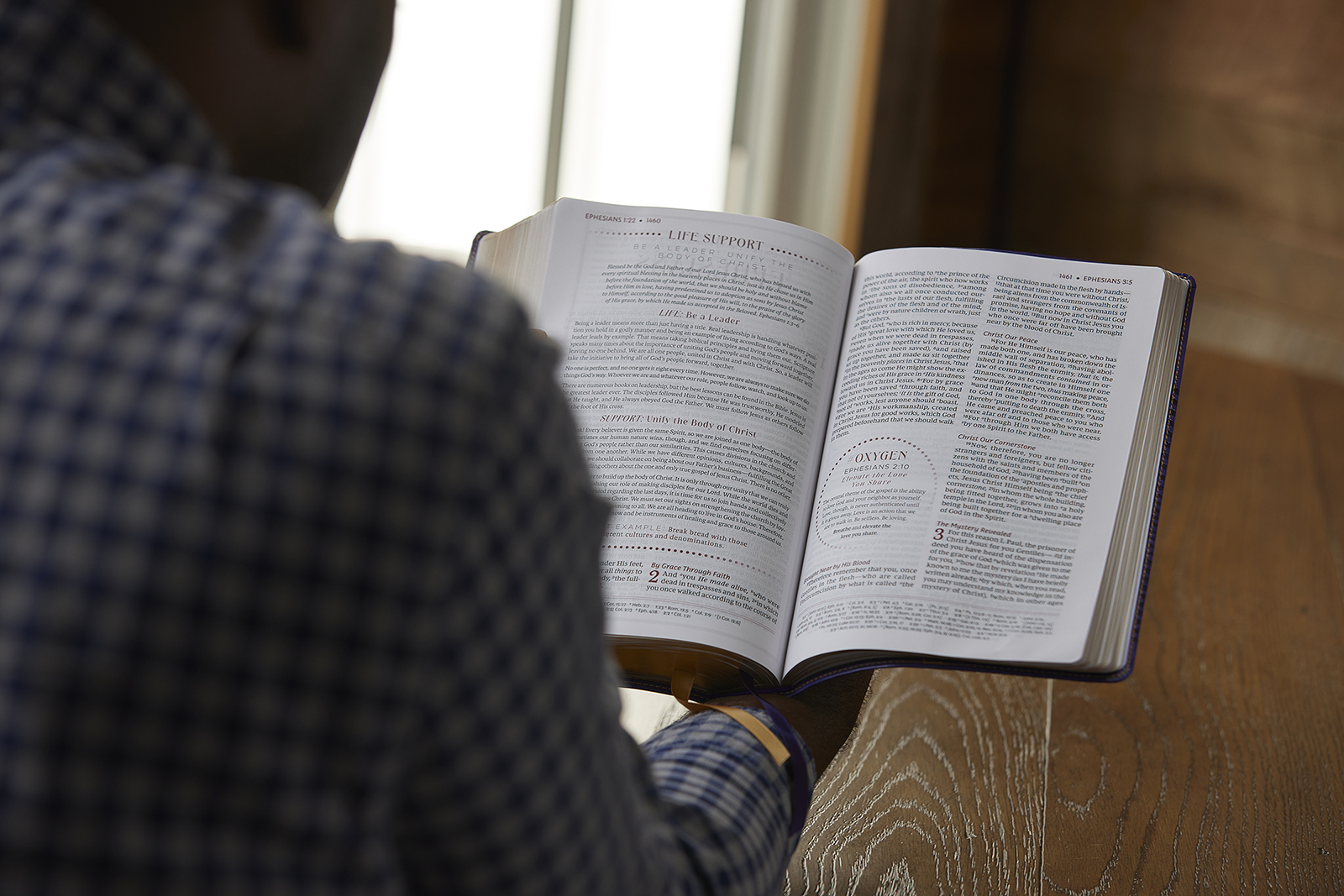 An individual reads "The Breathe Life Bible." (Courtesy photo)