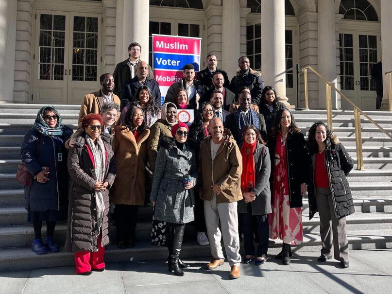 New York Muslim organization leaders pose together outside City Hall during the fourth annual Muslim Day, Feb. 8, 2024, in New York. (RNS photo/Fiona André)
