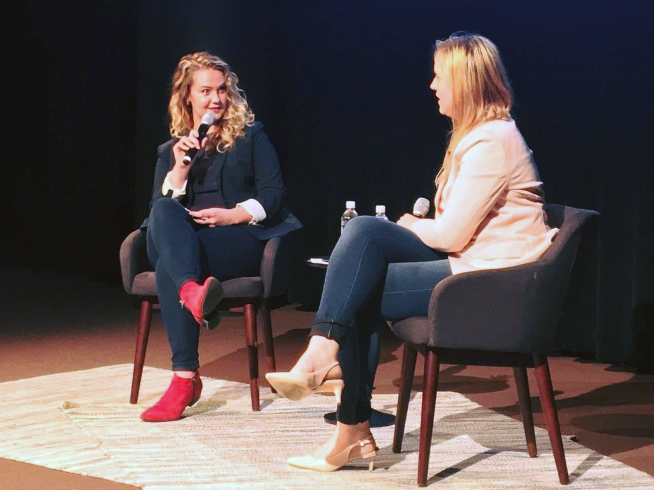 Ruth Schmidt, left, interviews a filmmaker for a live audience in Travis Auditorium at Fuller Theological Seminary in May 2019. (Courtesy photo)