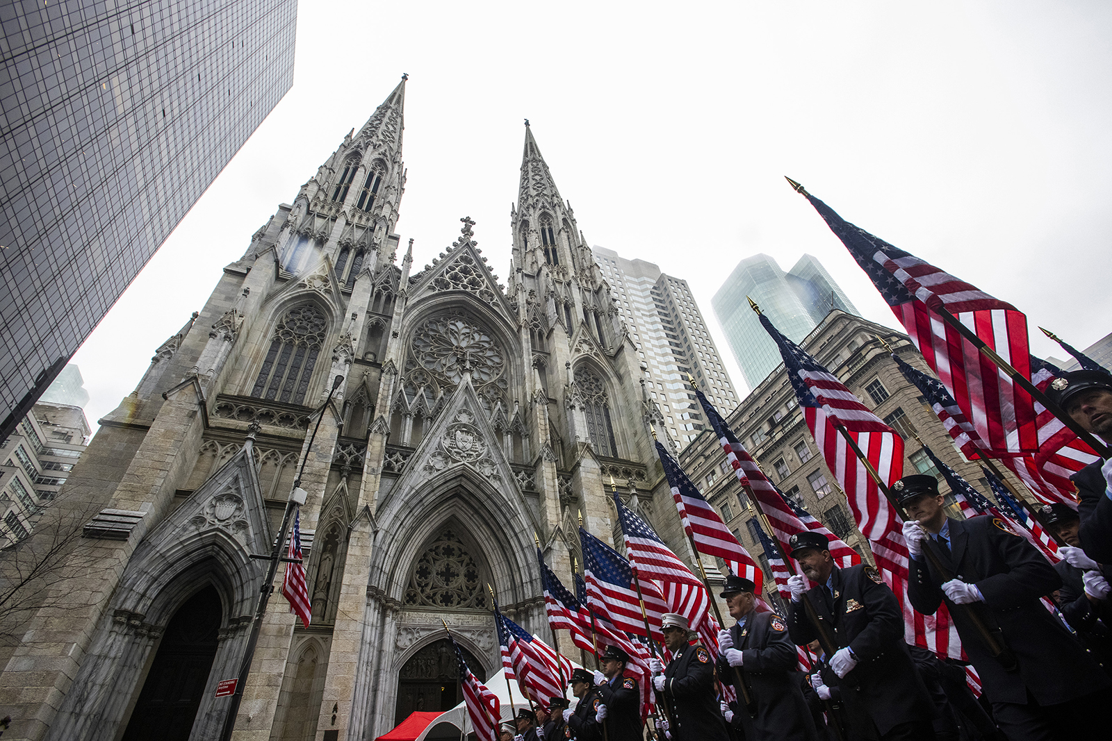 New York Fire Department Officers march up Fifth Avenue while they pass in front of St. Patrick's Cathedral during the St. Patrick's Day Parade, Thursday, March 17, 2022, in New York. (AP Photo/Eduardo Munoz Alvarez)