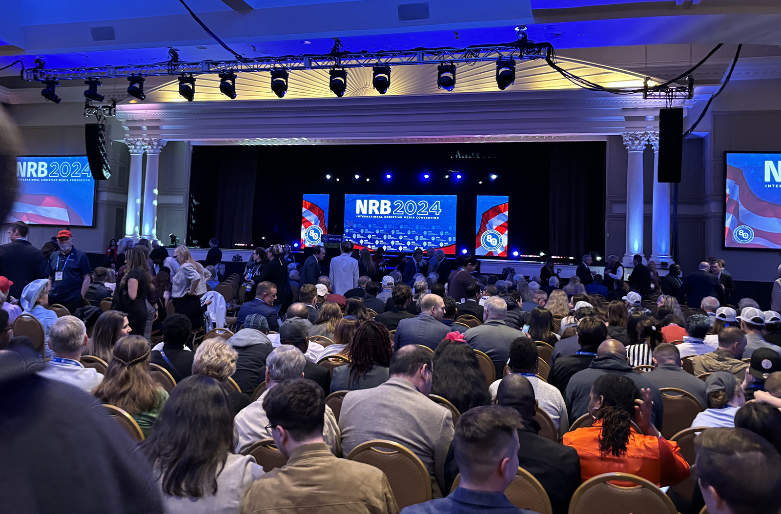 National Religious Broadcasters convention attendees await Republican presidential candidate former President Donald Trump, at the at the Gaylord Opryland Resort and Convention Center Thursday, Feb. 22, 2024, in Nashville, Tenn. (RNS photo/Bob Smietana)
