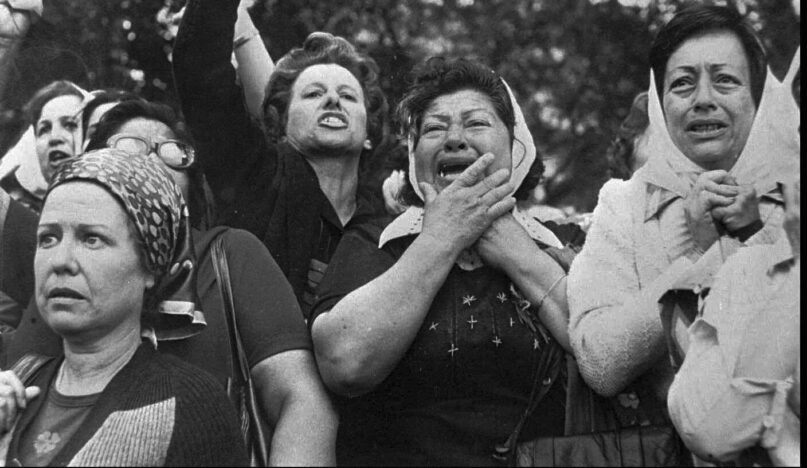 FILE - Members of the Mothers of Plaza de Mayo protest in San Martin Square in Buenos Aires, Argentina, Nov. 21, 1977.  Week after week, since April 1977, the mothers of disappeared children have gathered at the square that provided the group with its name, despite being discredited during the dictatorship as “crazy” and “terrorists.” (AP Photo, File)